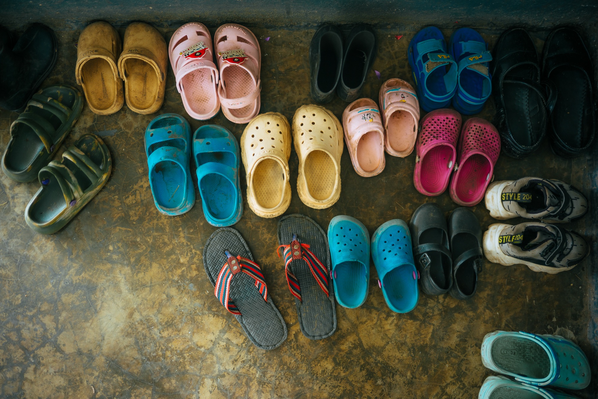 Giving side, Uganda: Shoes at the door
