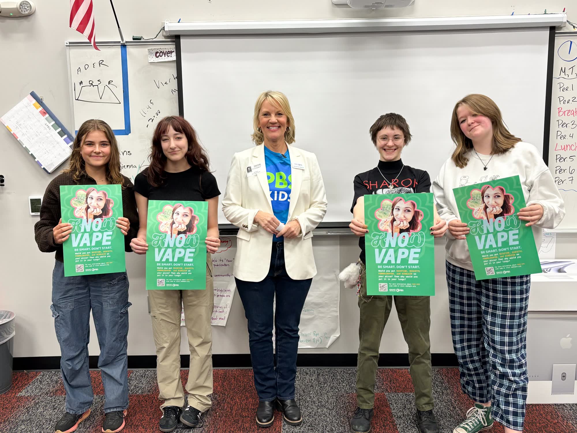 Students holding Know Vape posters in an Idaho classroom
