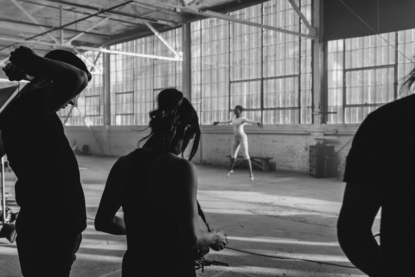 The team crossing the warehouse
