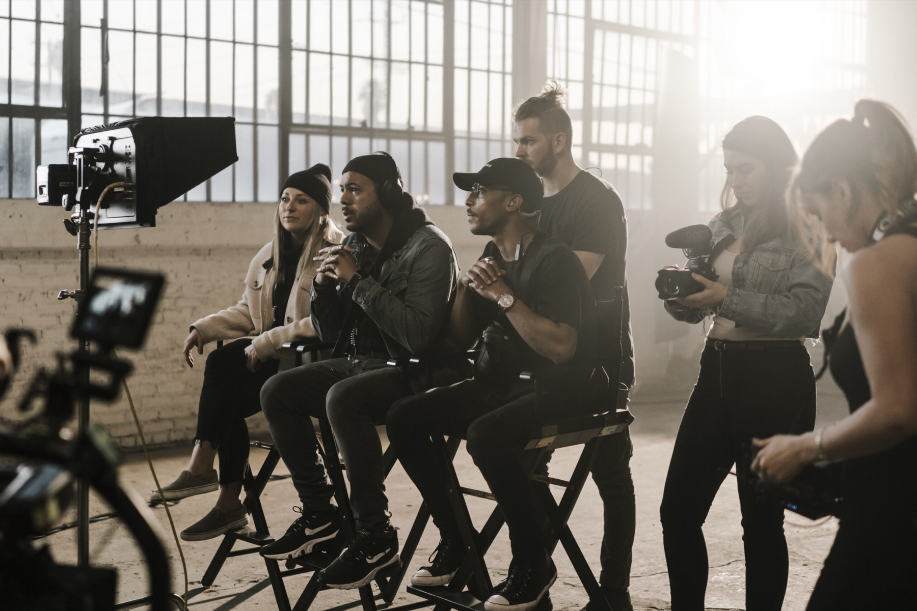 The Flow State crew on set, talent in the director's chairs