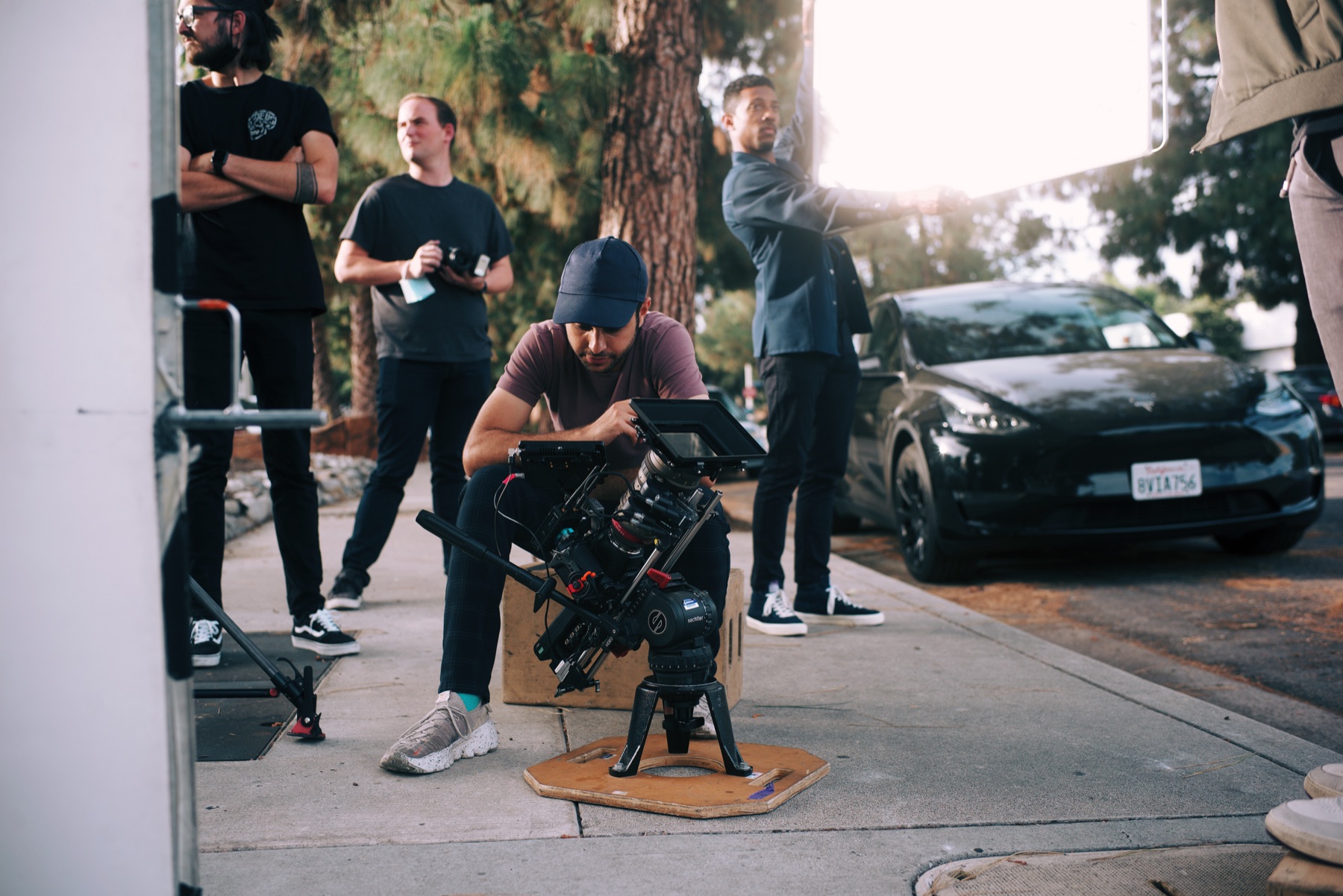 Full camera crew and gear on the outdoor shoot